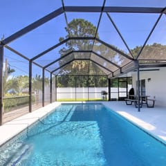 Pristine Newly Heated Pool Home Centrally Located